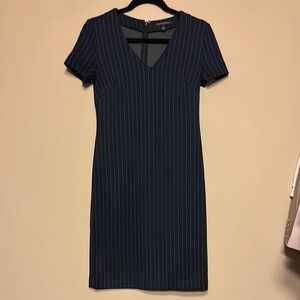 Blue knee-length sheath dress with short sleeves and v-neck for work